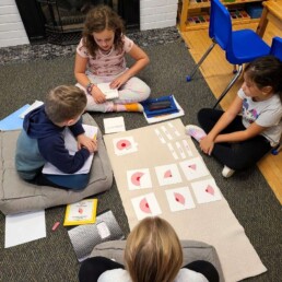 Montessori students learning about angles.
