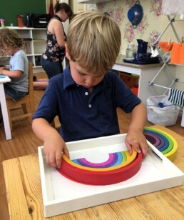 Montessori students during their first day back to school, September 2023. Colour, shape, and size matching.
