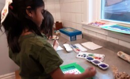 Lyonsgate Montessori elementary student making crying dot watercolour images.