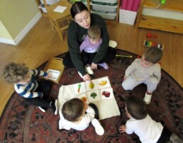 Lyonsgate Montessori Toddler students building food vocabulary.