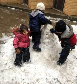Lyonsgate Montessori Casa students enjoying the brief appearance of snow.