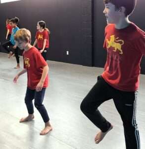 Lyonsgate Montessori Elementary students learning to step at Elev8 Dance as part of their phys. ed. program.