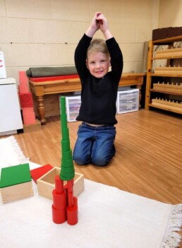 Successful results from hard work feel this good. Lyonsgate Montessori Casa student with some fine, fine motor skills development work with the Montessori Knobless Cylinders.