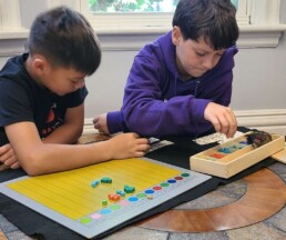 Lyonsgate Montessori School Elementary students reviewing operations with decimal fractions.