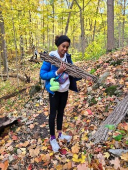 Lyonsgate Montessori School Elementary student found some giant pieces of tree bark.