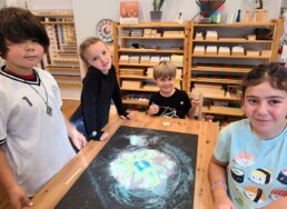 Lyonsgate Montessori School Elementary students working on their rangoli design while learning about Diwali.