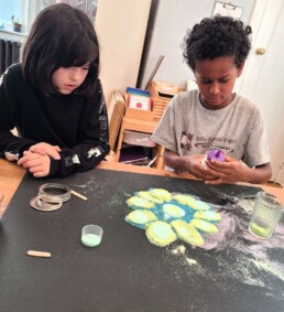 Lyonsgate Montessori School Elementary students working on their rangoli design while learning about Diwali.