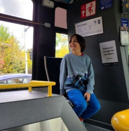 Lyonsgate Montessori School Elementary student riding public transit on a class outing.