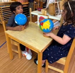 Lyonsgate Montessori School Casa students exploring the world together.