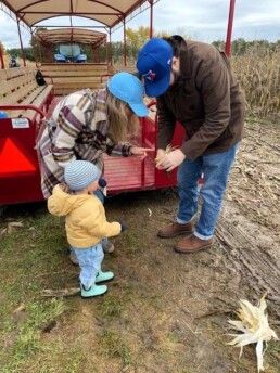Lyonsgate Montessori School Toddler family enjoying a field trip to a farm.