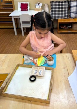 Lyonsgate Montessori School Casa student working with watercolour pencils.