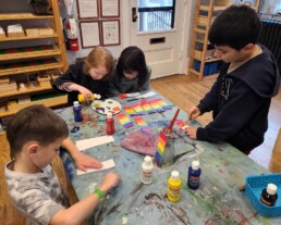 Lyonsgate Montessori School Elementary students bookmark production line for their charity outreach sale on Monday.