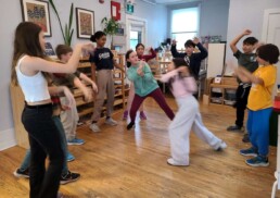 Lyonsgate Montessori School Elementary students choreographing a dance to the Star Wars theme.