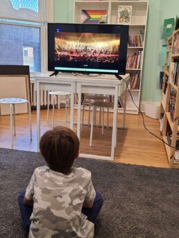 Lyonsgate Montessori School Elementary student experiencing the instruments of the orchestra before their trip to the Brott Education Concert this month.