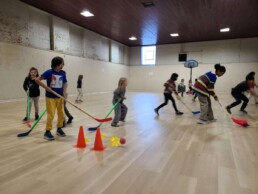 Lyonsgate Montessori School Elementary students playing a 