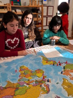 Lyonsgate Montessori School Elementary students learning about the spread of the English language.