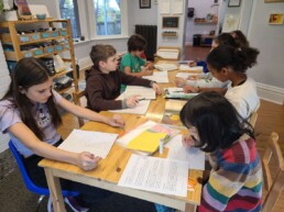 Lyonsgate Montessori School Elementary students working on a variety of parallel and collaborative work.