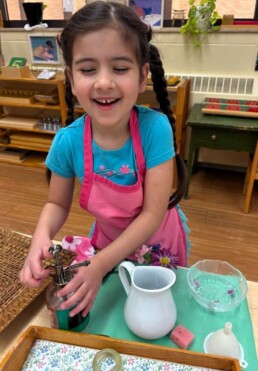 Lyonsgate Montessori School Casa student working at the Montessori Flower Arranging activity. Thank you for all of your beautiful flower donations for this activity.