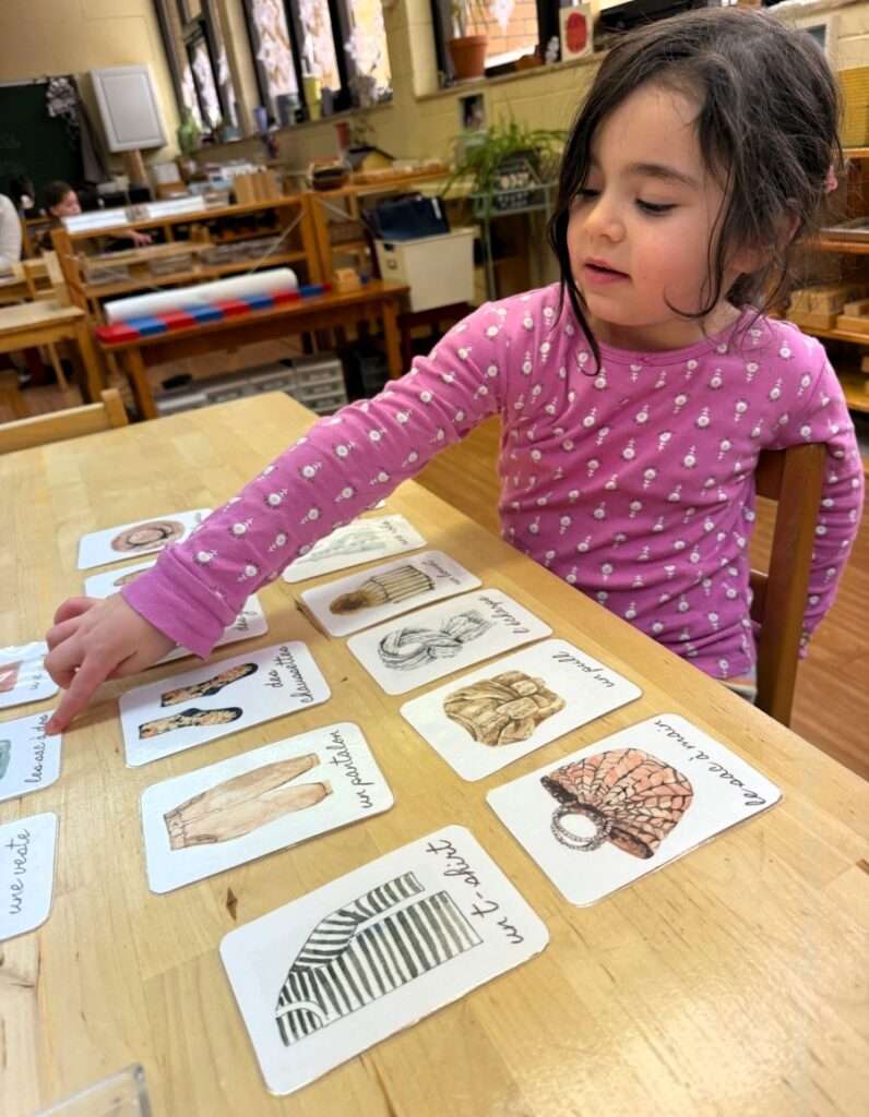 Lyonsgate Montessori School Casa student building her French language…</p><p class=
