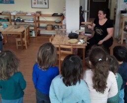 Lyonsgate Montessori School Casa students watching crepes being made for La Chandeleur.