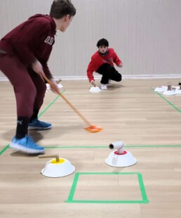 Lyonsgate Montessori School Elementary students created their own winter Olympic games, including pairs curling.