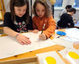 Lyonsgate Montessori School Elementary students learning about polygons.