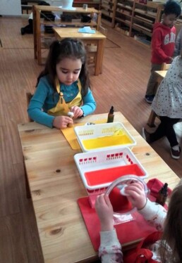 Lyonsgate Montessori School Casa students engaged with some Montessori Polishing activities.