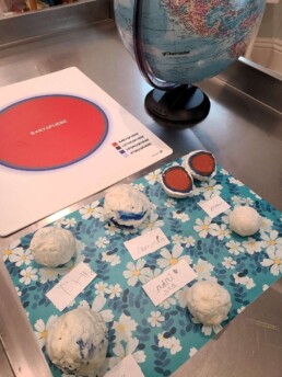 Lyonsgate Montessori School Elementary students created plasticine models of the composition of Earth.