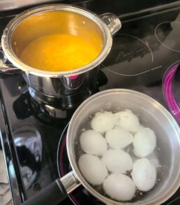 Lyonsgate Montessori School Elementary students preparing yellow dye from turmeric.
