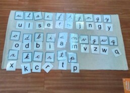 A Lyonsgate Montessori School Casa student matched print and cursive letters.