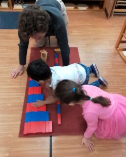 Lyonsgate Montessori School Casa students receiving an introduction to the concept of subtraction with the Montessori Number Rods material.
