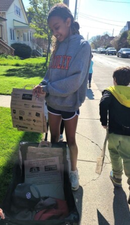 Lyonsgate Montessori School Elementary students participated as volunteers for the Kirkendall Food Drive.