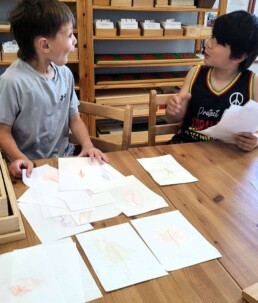 Lyonsgate Montessori School Elementary students excited by the seeming magic of botanical rubbings.