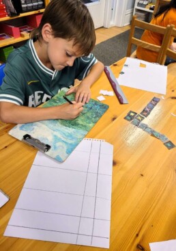 Lyonsgate Montessori School Elementary student making a Qwirkle set.