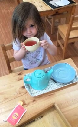 Lyonsgate Montessori School Casa student enjoying the fruits of her 